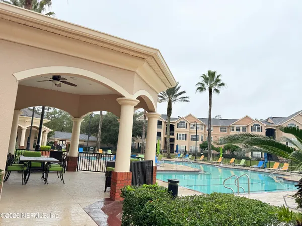 a view of a balcony and lake view