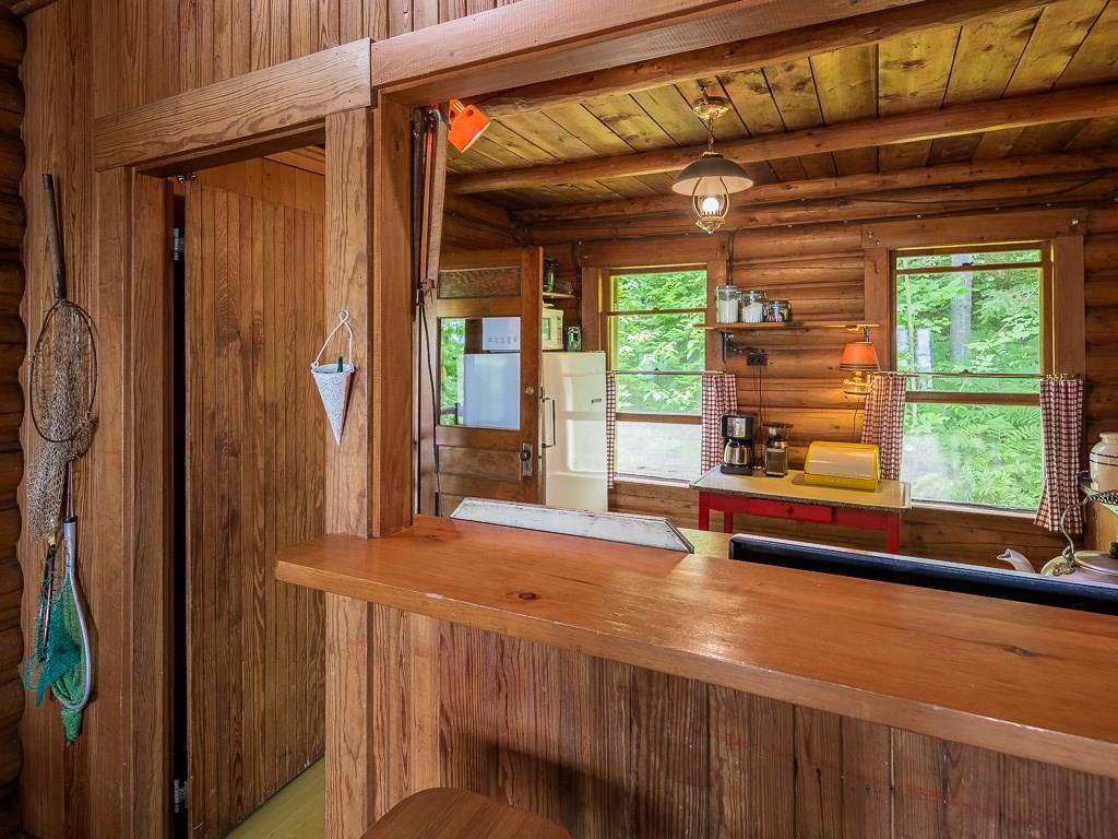 106 Herring Road Rangeley, ME 04970 - Photo 13 of 25 the built in bar overlooks the...