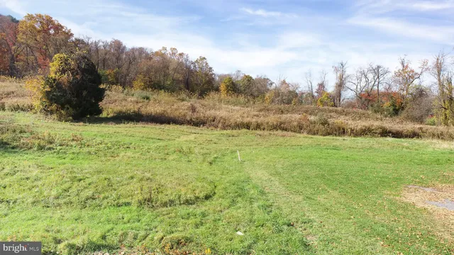 a view of an outdoor space with a lake view