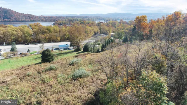 a view of a town with mountains in the background