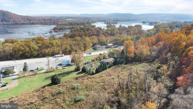 a view of a lake with mountains in the background