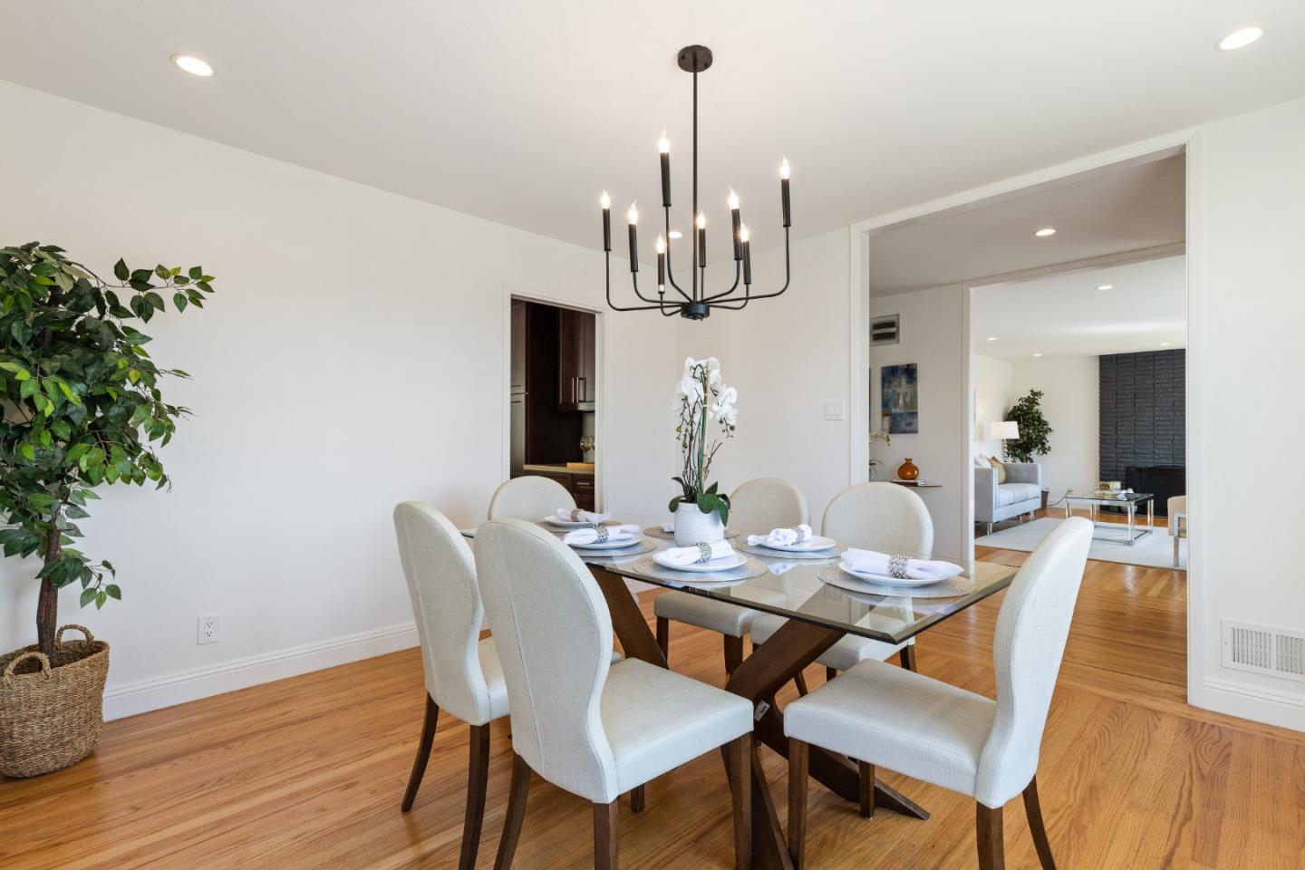 735 Clearfield Drive Millbrae, CA 94030 - Photo 14 of 64 a view of a dining room with furniture wooden floor and chandelier