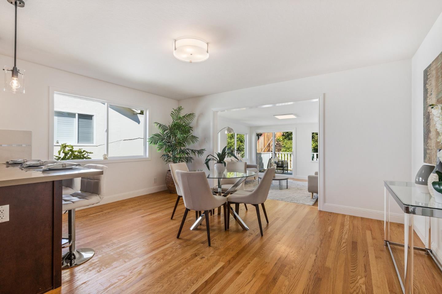 735 Clearfield Drive Millbrae, CA 94030 - Photo 22 of 64 a view of a dining room with furniture and wooden floor