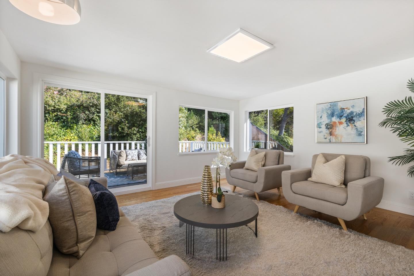 735 Clearfield Drive Millbrae, CA 94030 - Photo 25 of 64 a living room with furniture and a potted plant
