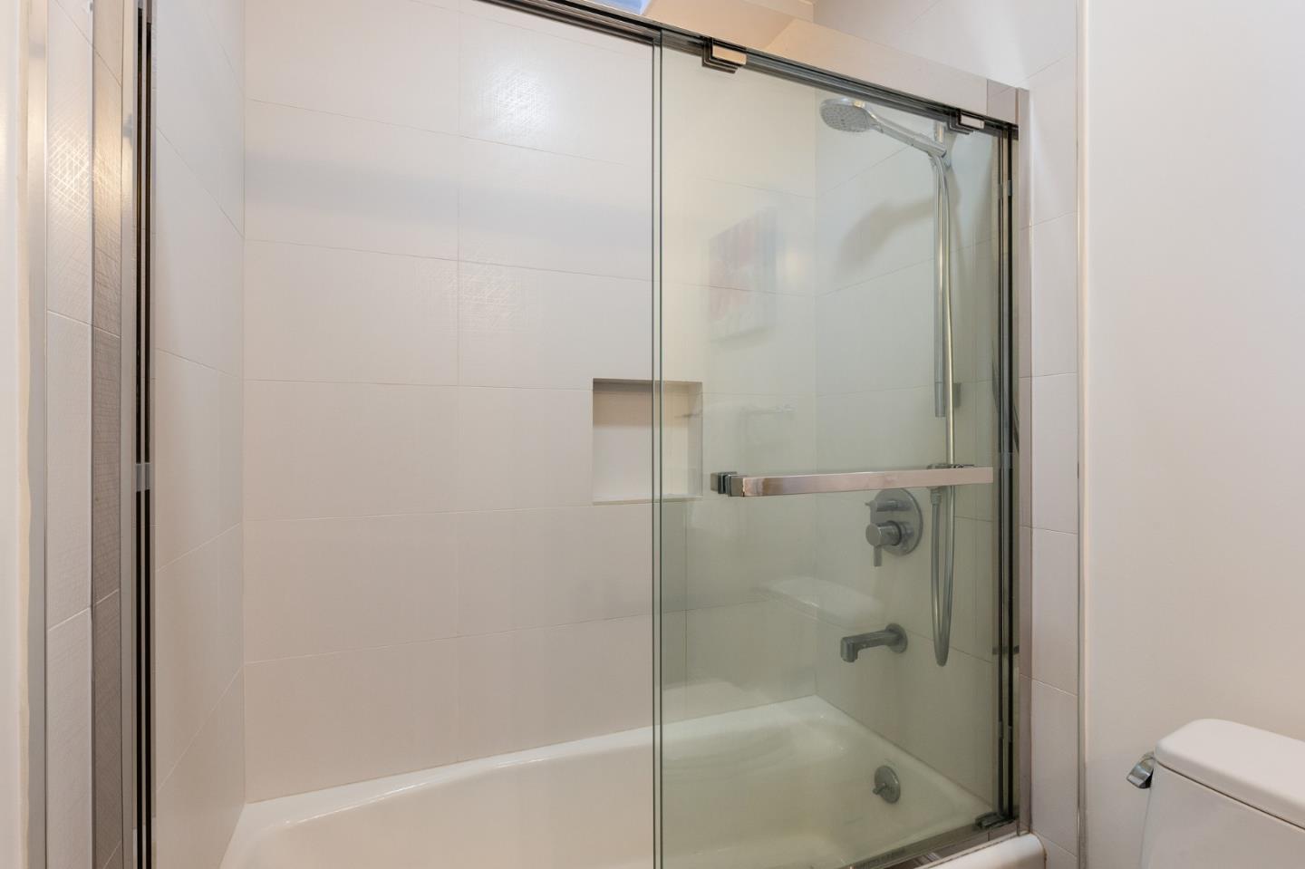 735 Clearfield Drive Millbrae, CA 94030 - Photo 28 of 64 a bathroom with a shower and a bath tub