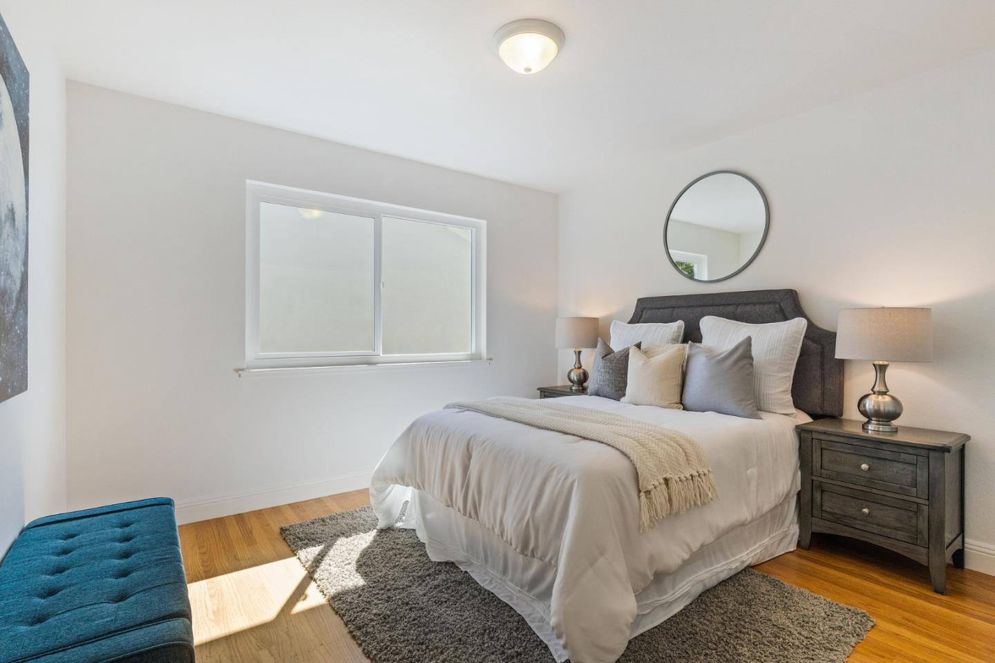 735 Clearfield Drive Millbrae, CA 94030 - Photo 29 of 64 a bedroom with bed and a window