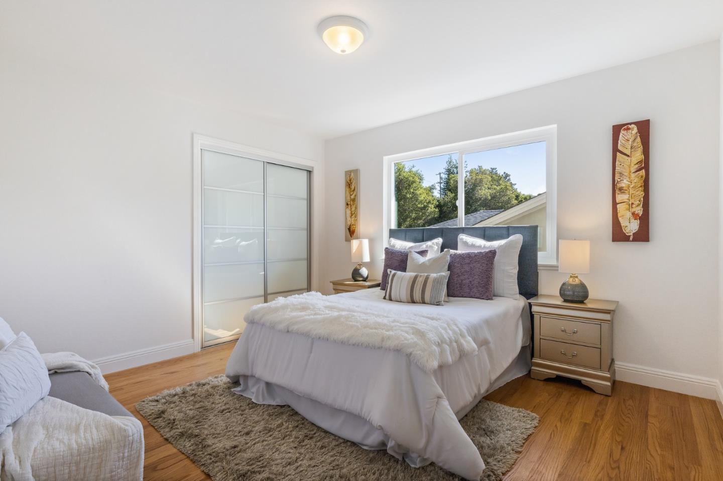 735 Clearfield Drive Millbrae, CA 94030 - Photo 31 of 64 a bedroom with a bed and a couch