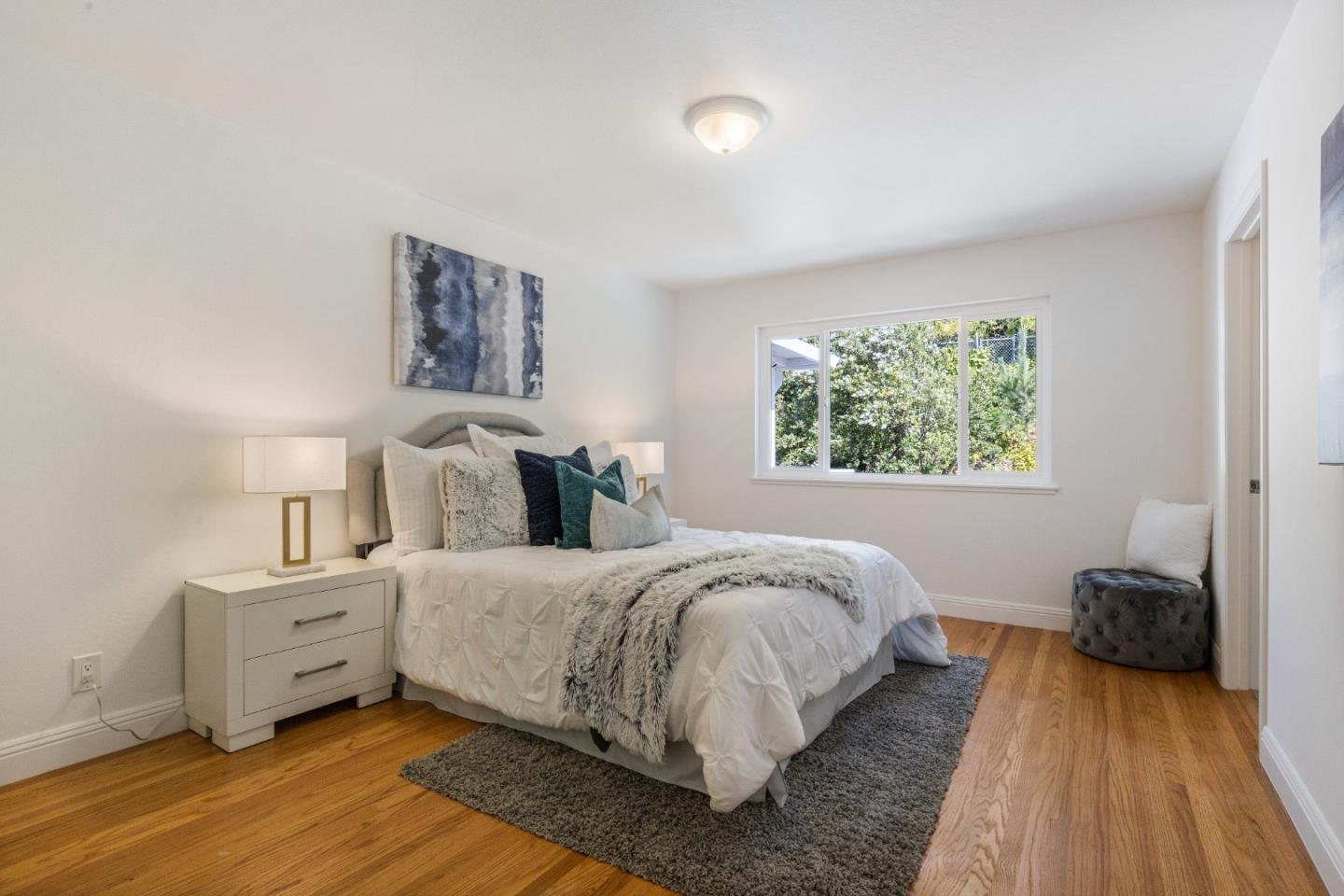 735 Clearfield Drive Millbrae, CA 94030 - Photo 33 of 64 a bedroom with a bed and a couch