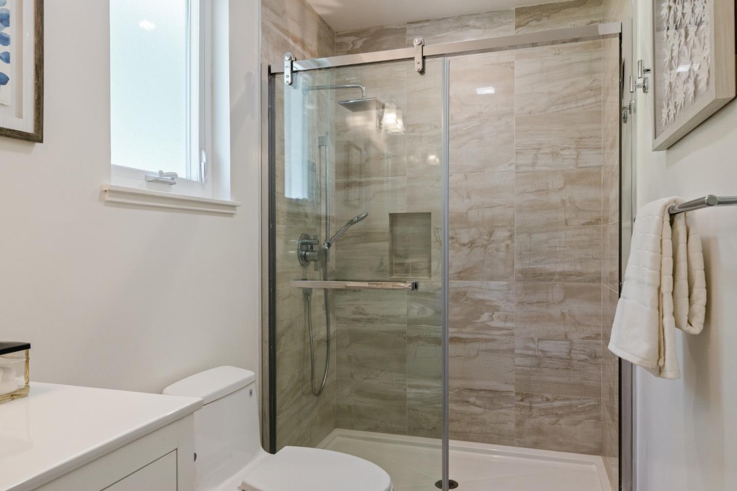 735 Clearfield Drive Millbrae, CA 94030 - Photo 37 of 64 a bathroom with a shower and toilet