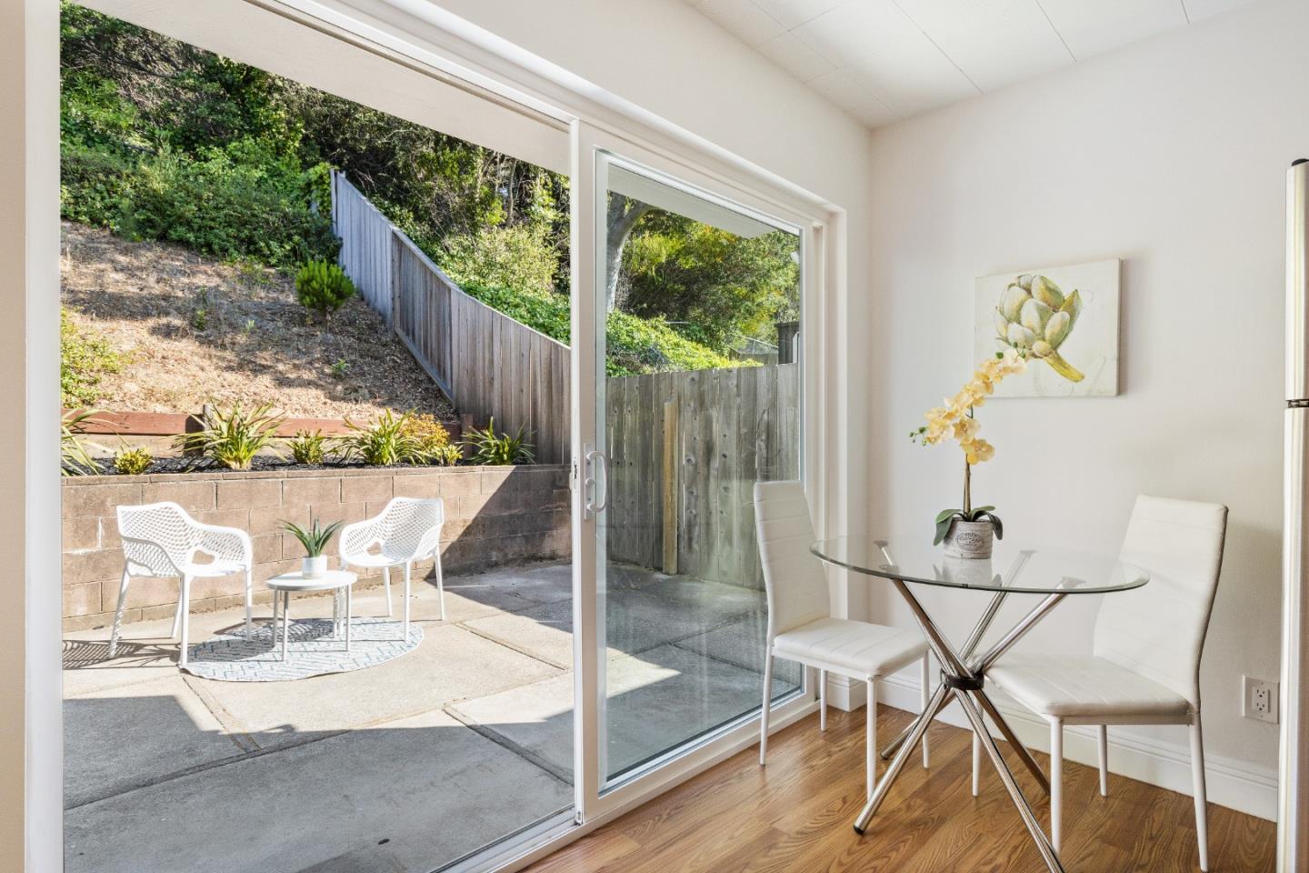 735 Clearfield Drive Millbrae, CA 94030 - Photo 42 of 64 a dining room table with wooden floor