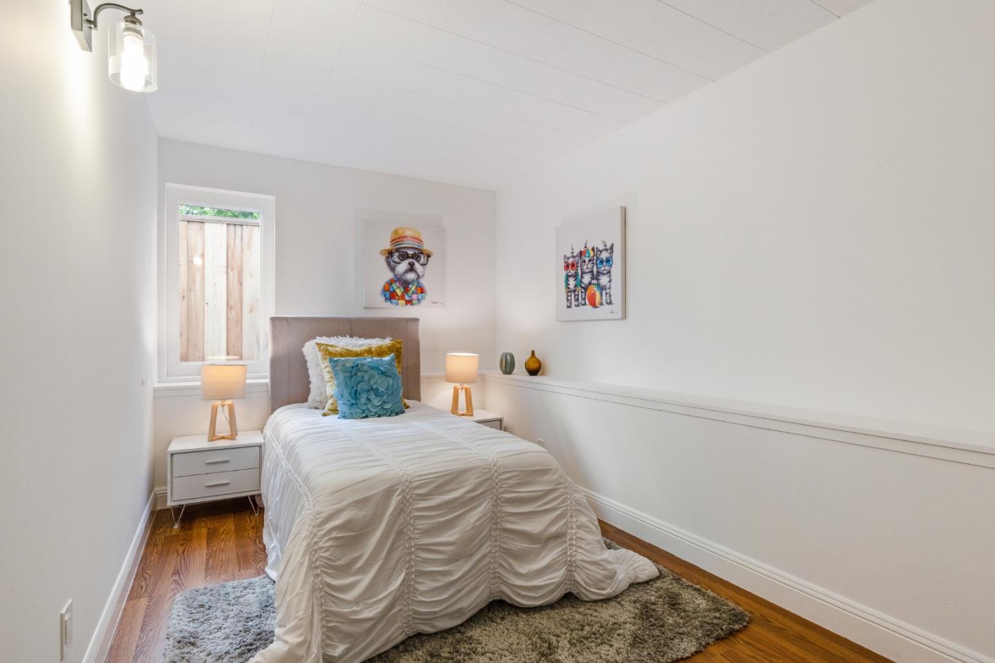 735 Clearfield Drive Millbrae, CA 94030 - Photo 48 of 64 a bedroom with a bed and a window