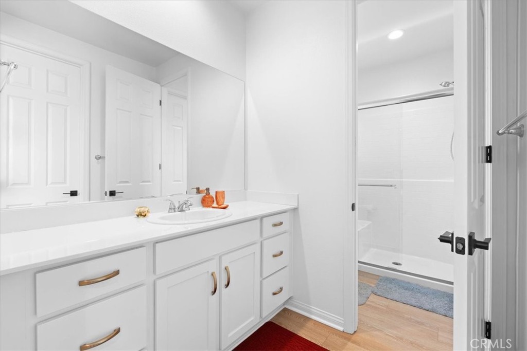 34490 Bloomberry Road Murrieta, CA 92563 - Photo 29 of 43 a view of a kitchen with white cabinets