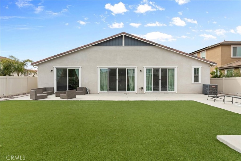 34490 Bloomberry Road Murrieta, CA 92563 - Photo 34 of 43 a front view of house with yard and outdoor seating