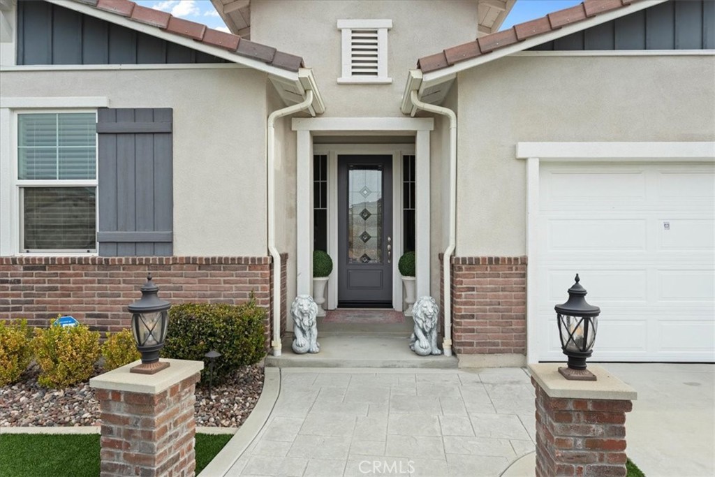 34490 Bloomberry Road Murrieta, CA 92563 - Photo 4 of 43 a view of a entryway door front of house