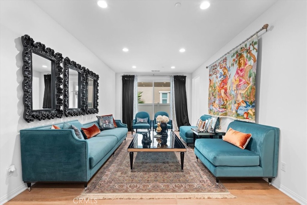 34490 Bloomberry Road Murrieta, CA 92563 - Photo 7 of 43 a living room with furniture and a rug