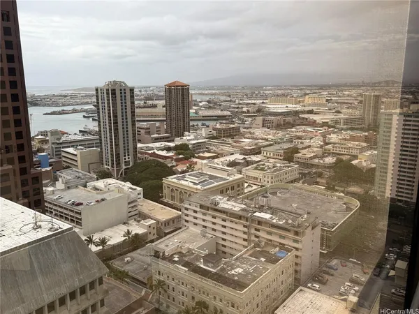 a view of city with ocean