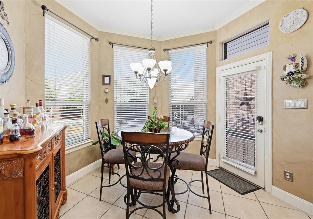 1316 Rio Grande Drive Allen, TX 75013 - Photo 15 of 40 a dining room with furniture and window