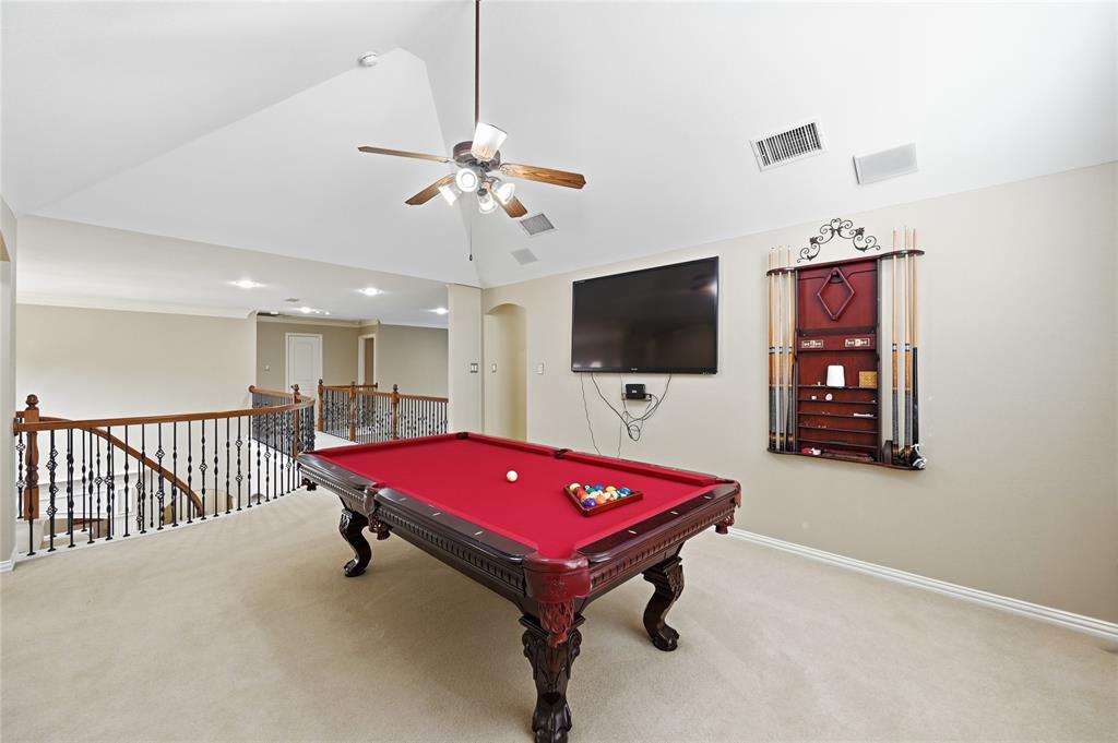 1316 Rio Grande Drive Allen, TX 75013 - Photo 22 of 40 a room with pool table flat screen tv and windows