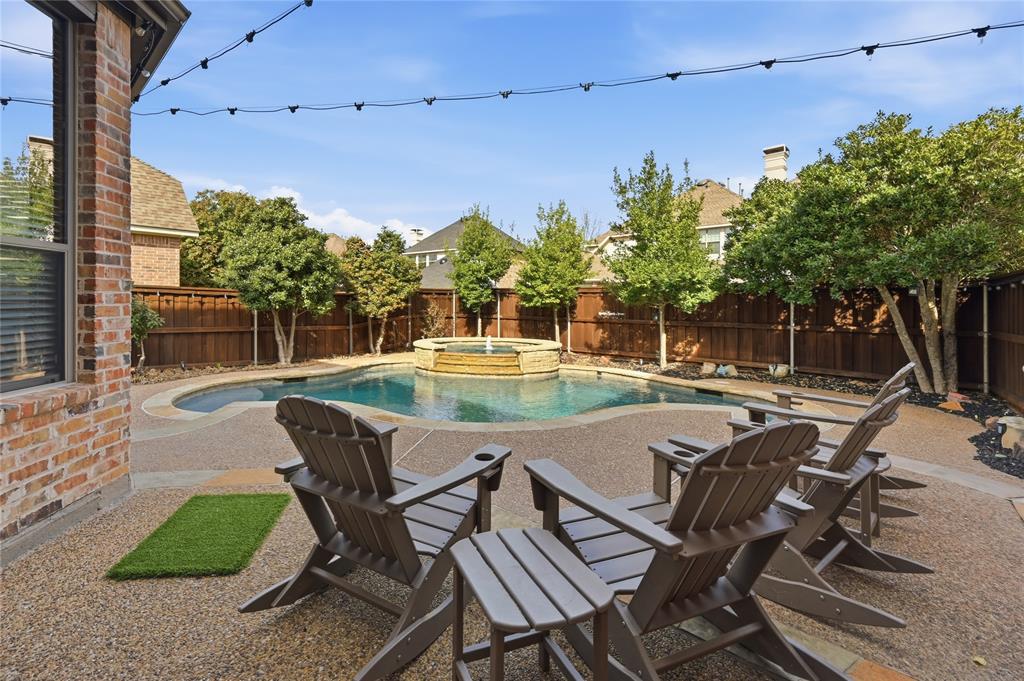 1316 Rio Grande Drive Allen, TX 75013 - Photo 32 of 40 a swimming pool with outdoor seating and yard