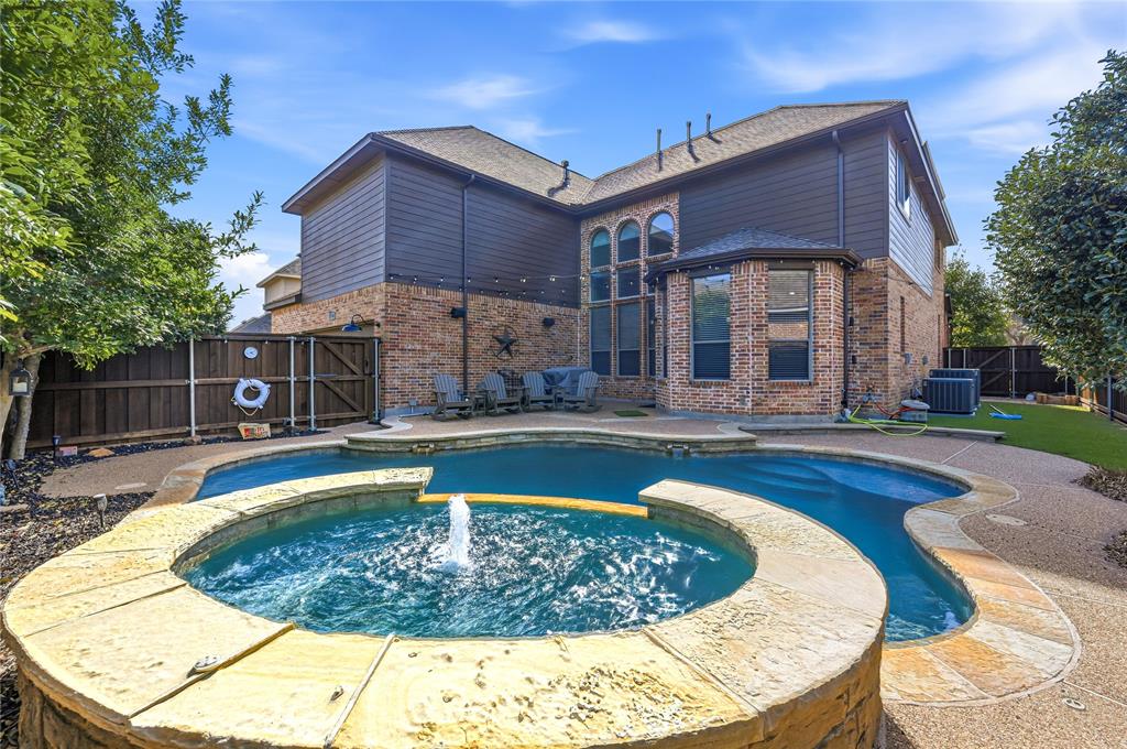 1316 Rio Grande Drive Allen, TX 75013 - Photo 33 of 40 a view of a house with swimming pool