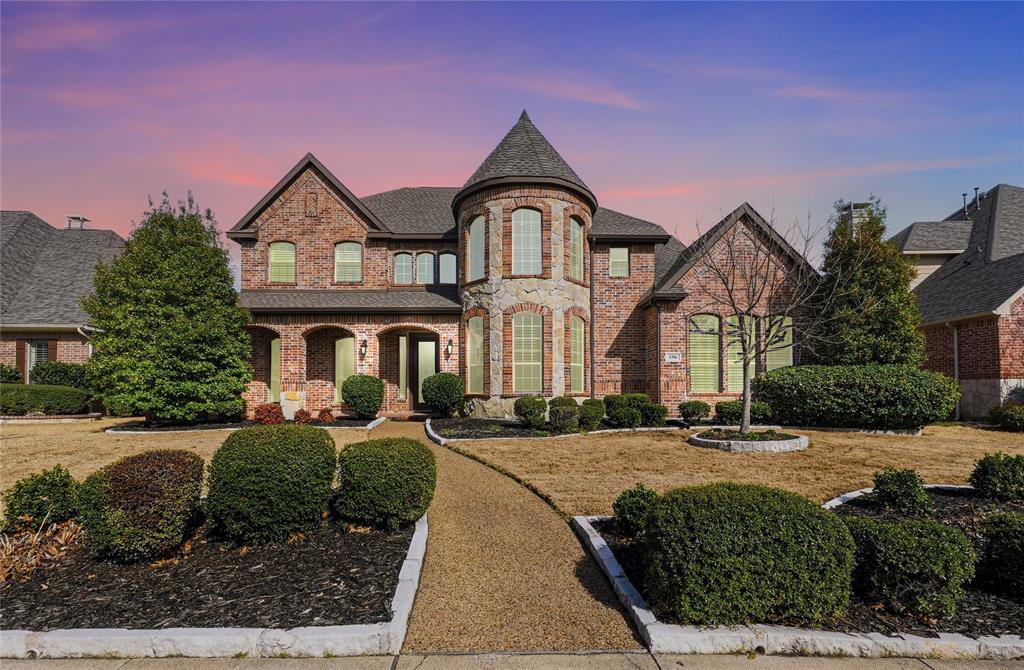 1316 Rio Grande Drive Allen, TX 75013 - Photo 34 of 40 a front view of a house with garden