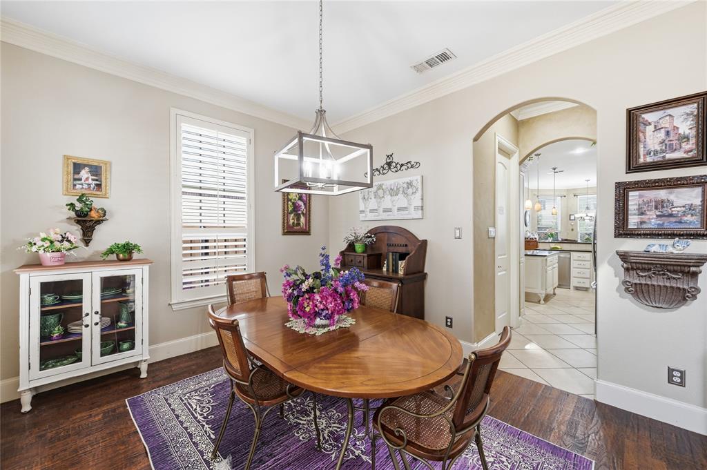1316 Rio Grande Drive Allen, TX 75013 - Photo 9 of 40 a view of a dining room with furniture window and wooden floor