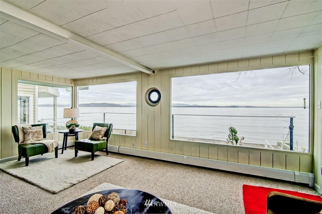 3217 Point Place Southwest Seattle, WA 98116 - Photo 1 of 25 a living room with furniture and a window