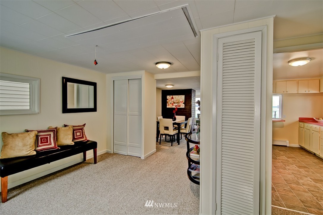 3217 Point Place Southwest Seattle, WA 98116 - Photo 6 of 25 a living room with furniture and a window