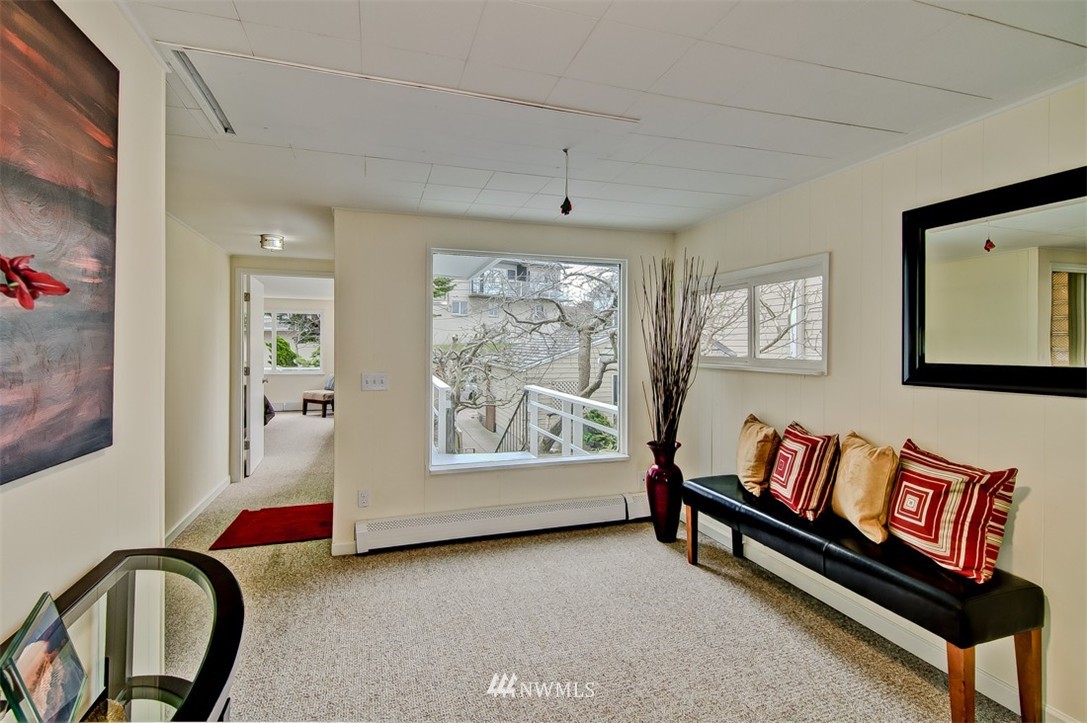 3217 Point Place Southwest Seattle, WA 98116 - Photo 8 of 25 a living room with furniture and a window