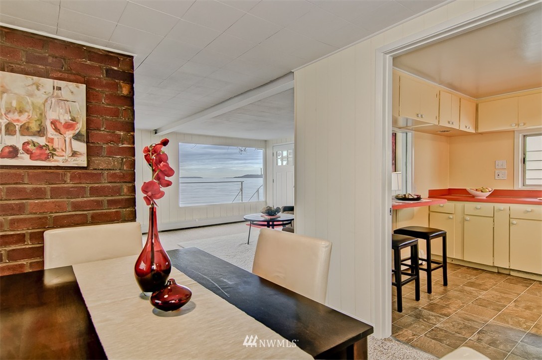 3217 Point Place Southwest Seattle, WA 98116 - Photo 10 of 25 a hallway with a view of living room