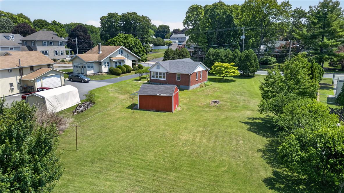 1166 Stones Crossing Road Easton, PA 18045 - Photo 20 of 35 A well-maintained lawn stretches across this property, offering ample space for outdoor activities.