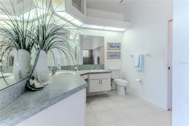 a bedroom with bed and a window