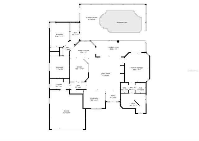 a front view of a house with yard and green space
