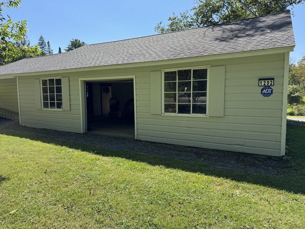 1292 Lenox Road, Unit 1 Richmond, MA 01254 - Photo 12 of 16 a house with garden in front of it