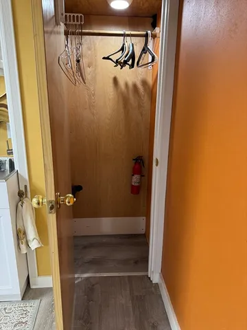 a bathroom with a shower and toilet