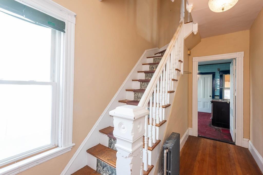 175 Riverside Avenue Medford, MA 02155 - Photo 12 of 38 a view of entryway with wooden floor