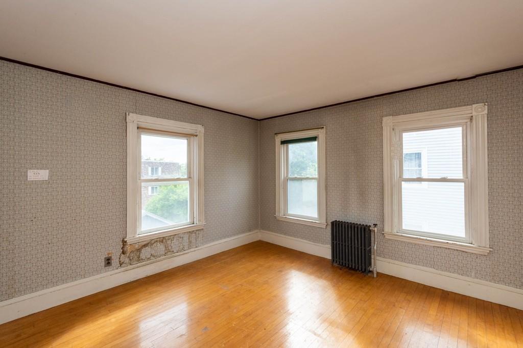 175 Riverside Avenue Medford, MA 02155 - Photo 17 of 38 an empty room with windows