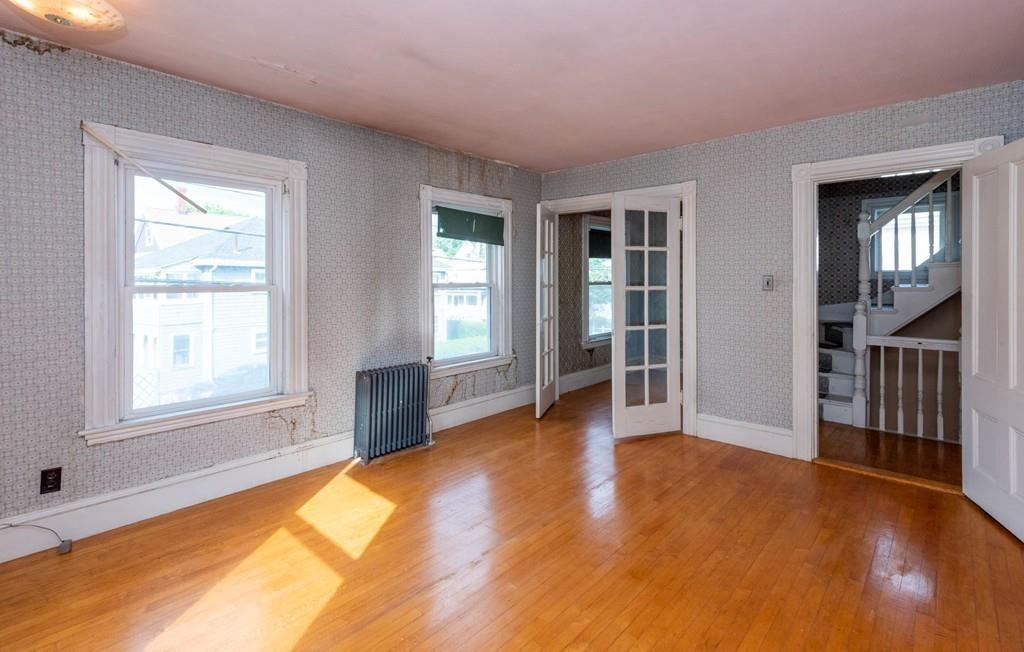 175 Riverside Avenue Medford, MA 02155 - Photo 20 of 38 an empty room with windows