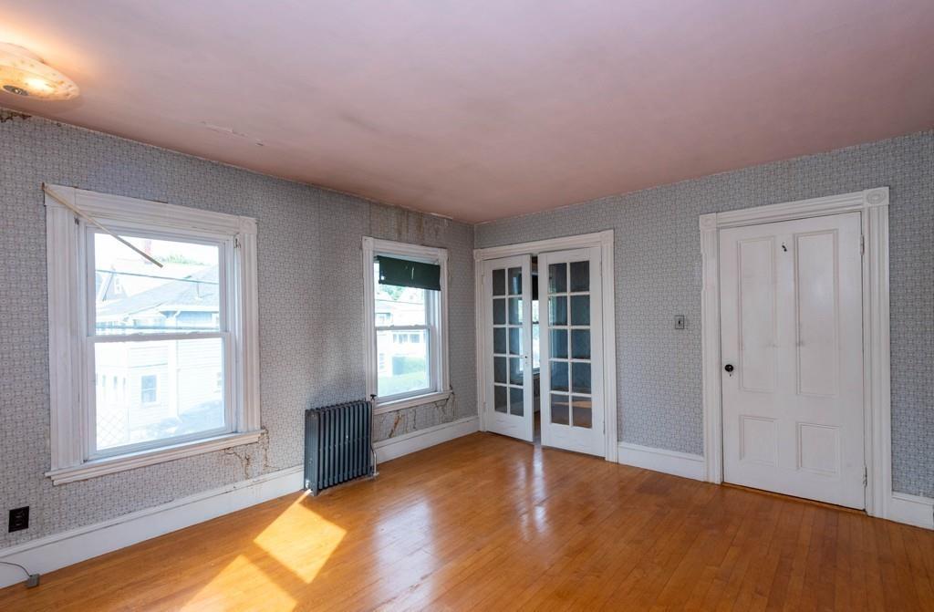175 Riverside Avenue Medford, MA 02155 - Photo 21 of 38 an empty room with windows