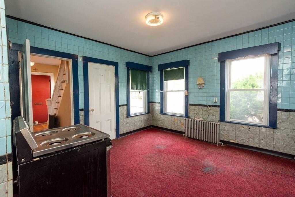 175 Riverside Avenue Medford, MA 02155 - Photo 29 of 38 an empty room with windows