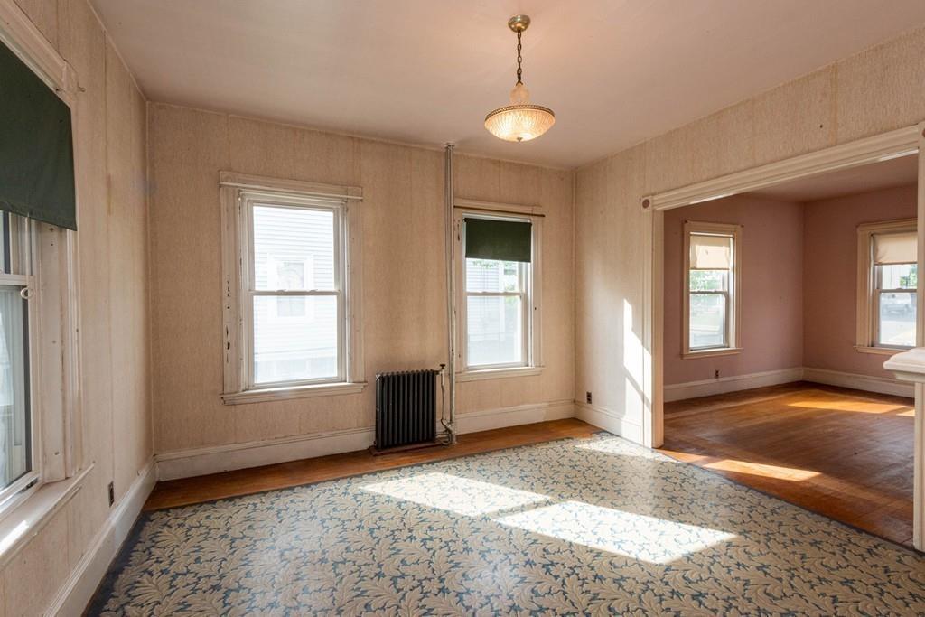 175 Riverside Avenue Medford, MA 02155 - Photo 5 of 38 an empty room with windows and closet