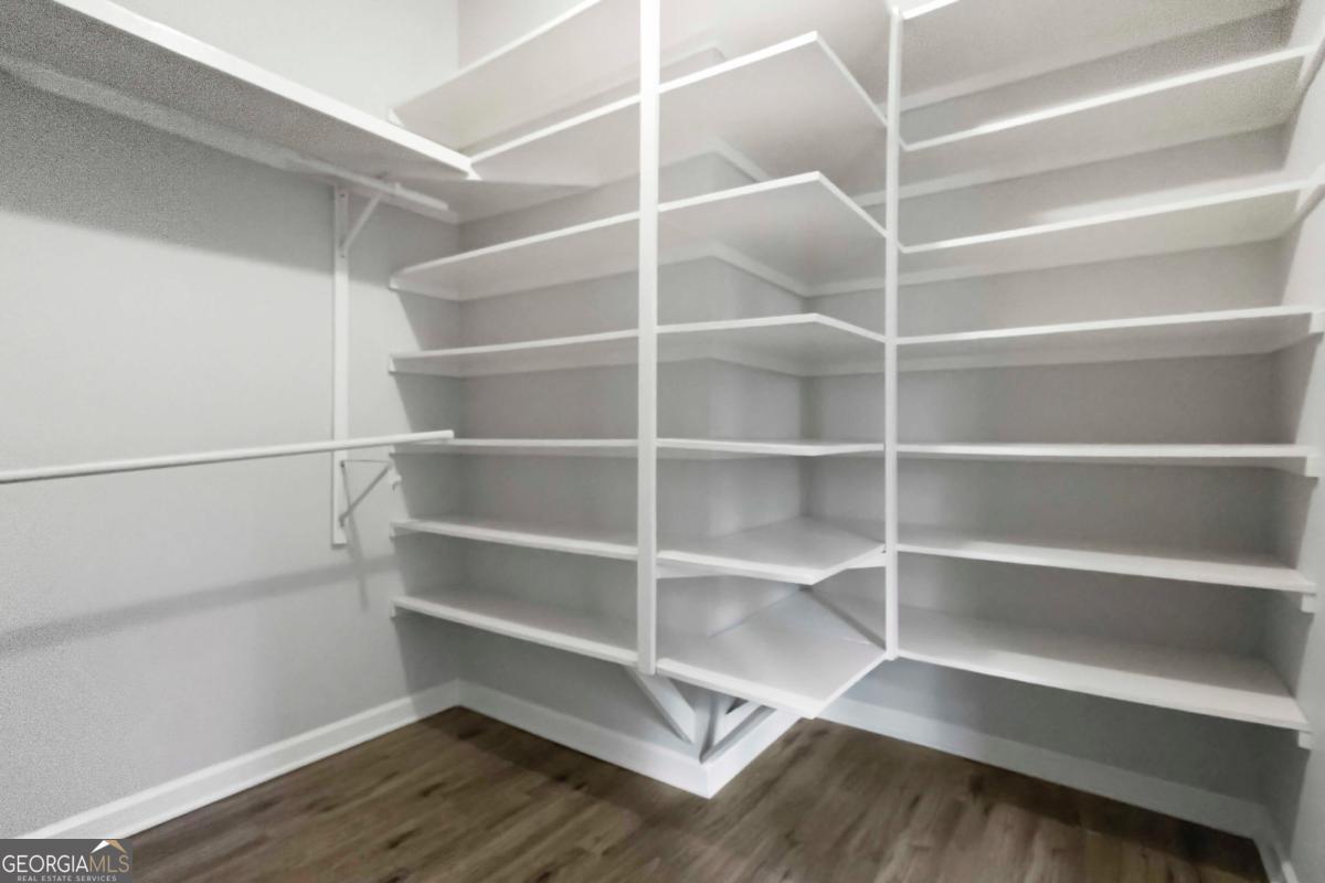 2312 Wayside Drive Brookhaven, GA 30319 - Photo 11 of 18 a view of walk in closet with empty racks