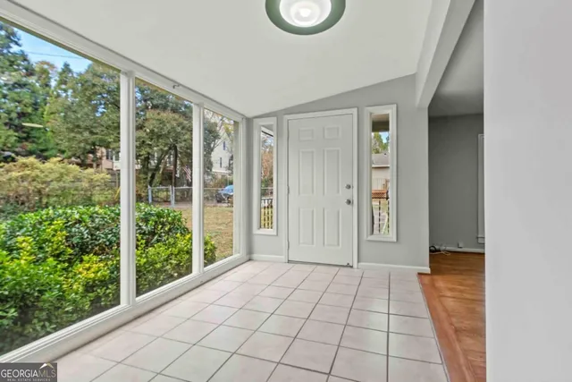 a view of a room with windows