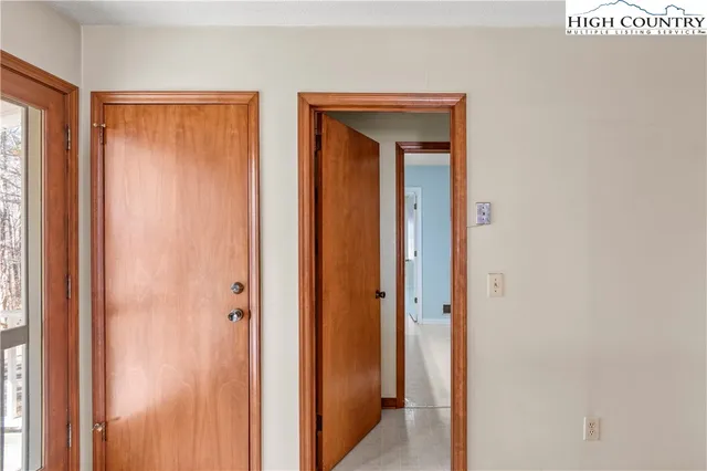 a view of a bathroom from a hallway
