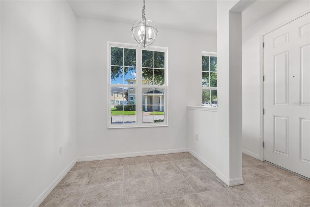 4824 Poolside Drive St. Cloud, FL 34769 - Photo 4 of 29 an empty room with windows and entrance