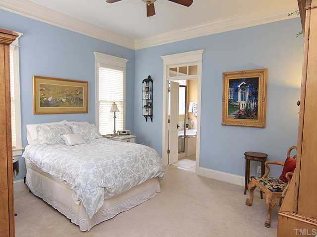 10323 Evergreen Spring Place Raleigh, NC 27614 - Photo 8 of 12 First floor master bedroom adjoins luxurious bath with cath ceilings and walk-in closet.
