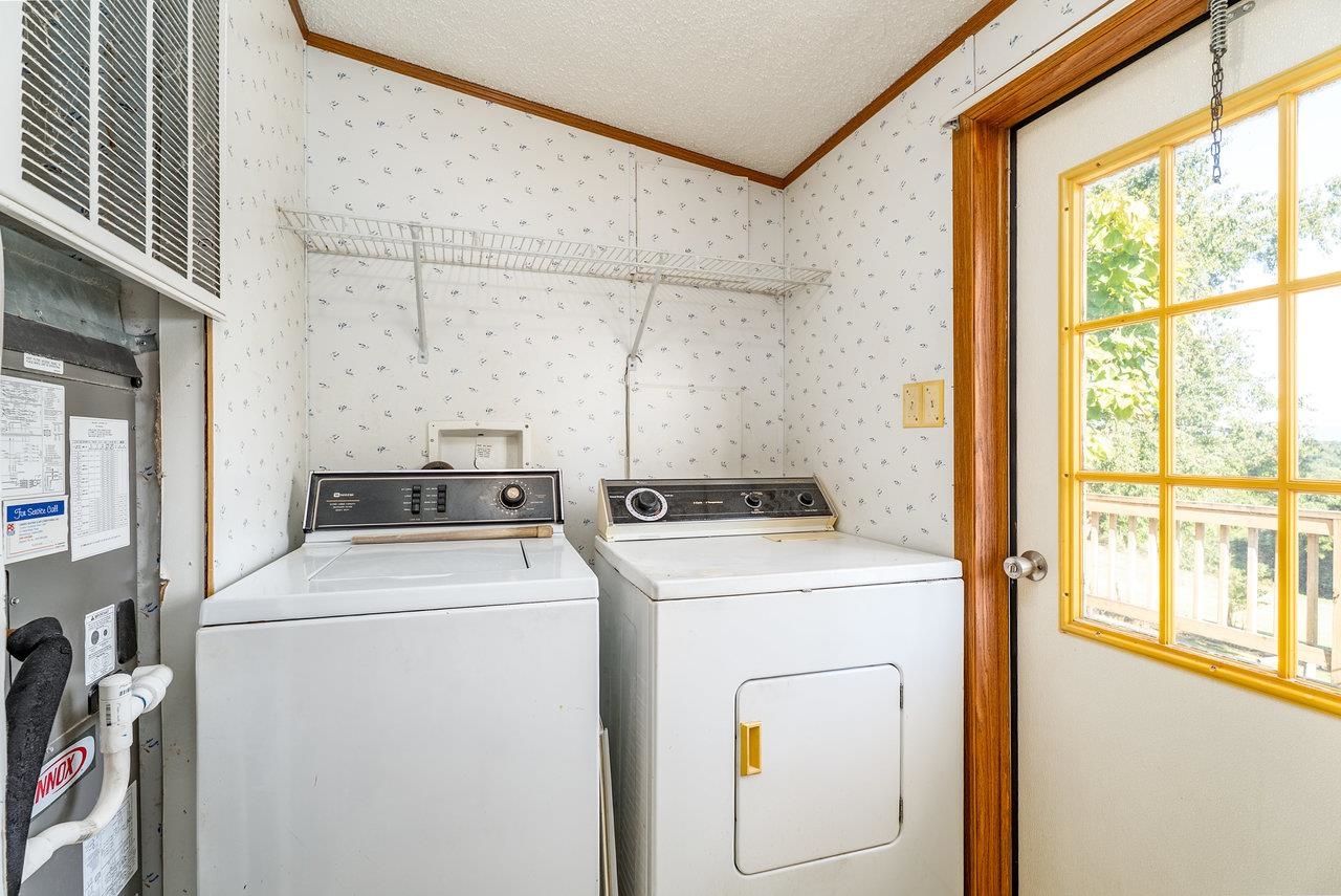 9072 Shultztown Road Linville, VA 22834 - Photo 19 of 51 a utility room with dryer and washer