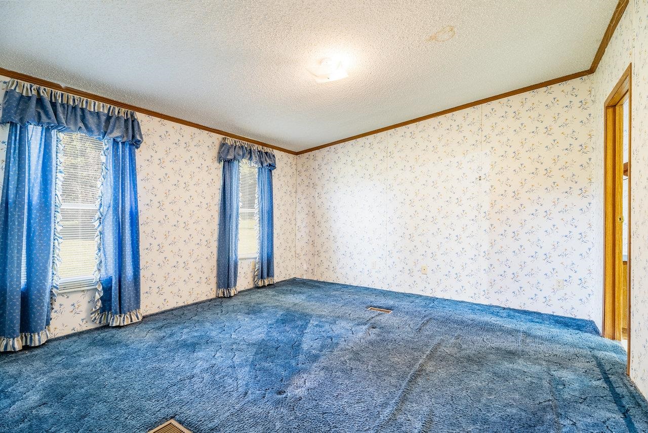 9072 Shultztown Road Linville, VA 22834 - Photo 22 of 51 a view of an empty room with a window