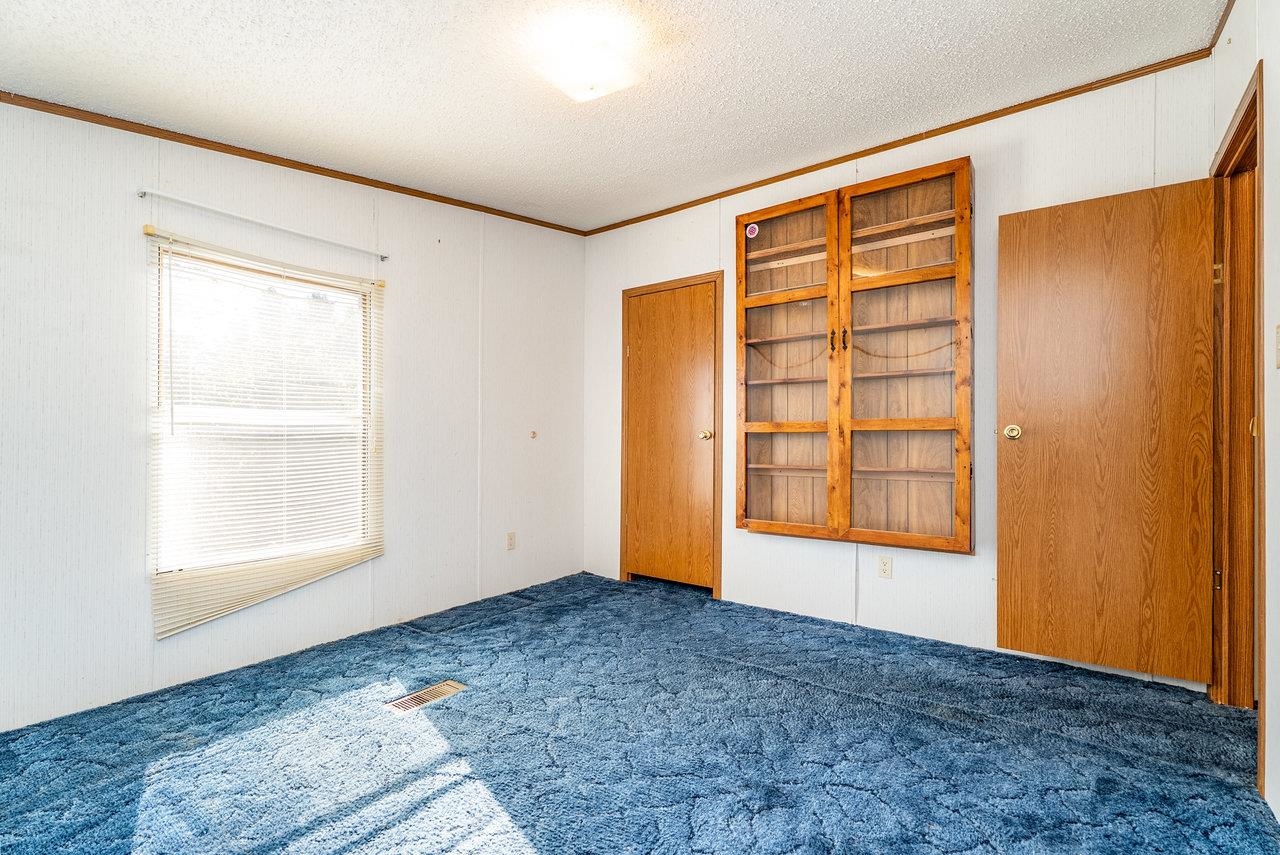 9072 Shultztown Road Linville, VA 22834 - Photo 27 of 51 an empty room with a window