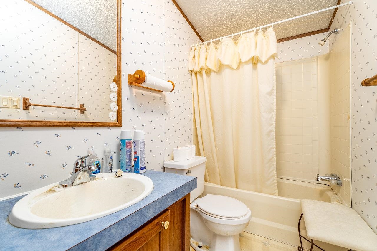 9072 Shultztown Road Linville, VA 22834 - Photo 28 of 51 a bathroom with a sink and a mirror